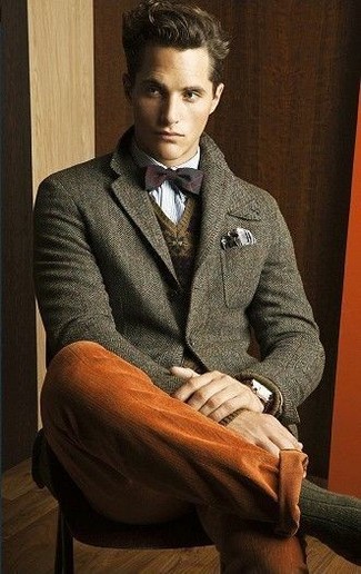 Brown Fair Isle V-neck Sweater Outfits For Men: Combining a brown fair isle v-neck sweater with tobacco chinos is a smart pick for an off-duty ensemble.