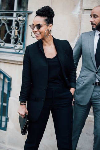 Silver Earrings Outfits: This totaly stylish relaxed casual ensemble is easy to break down: a black blazer and silver earrings.