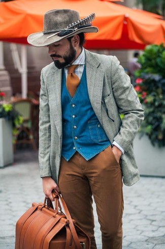 Brown Duffle Bag Outfits For Men: A grey plaid wool blazer and a brown duffle bag are must-have essentials if you're picking out a casual wardrobe that holds to the highest menswear standards.