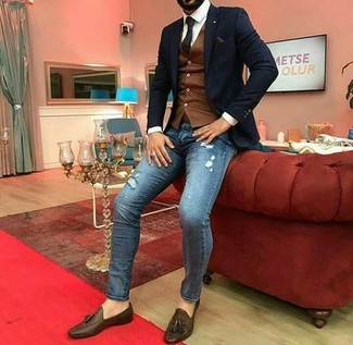 Brown Waistcoat Outfits: This pairing of a brown waistcoat and blue ripped skinny jeans is solid proof that a straightforward off-duty look doesn't have to be boring. Punch up your look with dark brown leather tassel loafers.