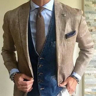 Dark Brown Polka Dot Tie Outfits For Men: You'll be amazed at how super easy it is to pull together this elegant outfit. Just a tan blazer and a dark brown polka dot tie.