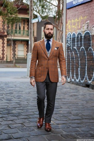 Brown Plaid Blazer Outfits For Men: Pairing a brown plaid blazer and charcoal dress pants will be a true testimony to your sartorial savvy. Introduce dark brown leather double monks to the equation and the whole getup will come together wonderfully.