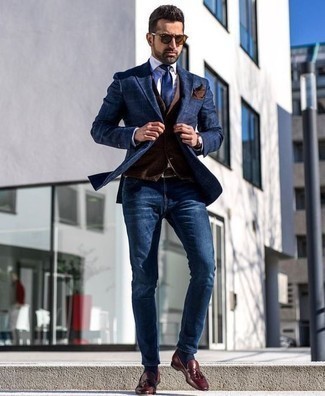 Brown Waistcoat Outfits: You'll be amazed at how easy it is to put together this refined look. Just a brown waistcoat worn with navy jeans. For maximum effect, complete your look with a pair of burgundy leather tassel loafers.