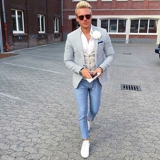 Beige Waistcoat Outfits: This sophisticated combination of a beige waistcoat and light blue chinos is a popular choice among the dapper chaps. To infuse a playful touch into your ensemble, complete this getup with a pair of white canvas low top sneakers.
