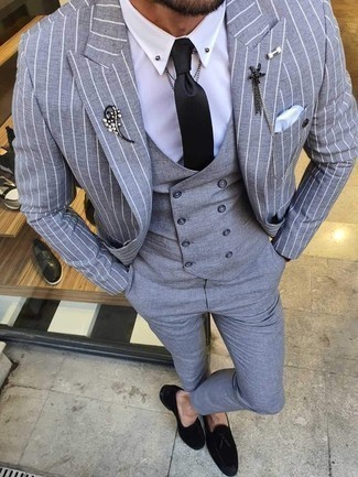 Grey Waistcoat Outfits: Nail the classic look with a grey waistcoat and grey chinos. The whole look comes together perfectly if you add black suede tassel loafers to the mix.