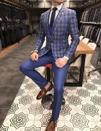 Blue Plaid Blazer Outfits For Men: You're looking at the indisputable proof that a blue plaid blazer and blue dress pants are amazing when worn together in an elegant outfit for today's man. Complete your look with a pair of brown leather tassel loafers and you're all done and looking incredible.