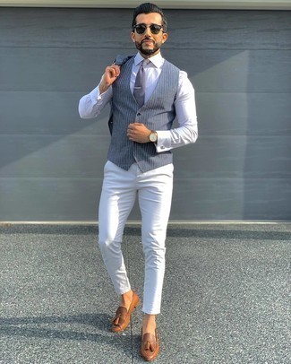 Grey Vertical Striped Blazer Outfits For Men: A grey vertical striped blazer and white chinos are among the fundamental elements in any modern gent's functional wardrobe. To bring a bit of flair to your ensemble, complement this ensemble with a pair of tobacco leather tassel loafers.