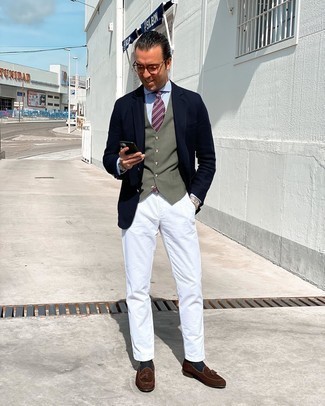 Olive Waistcoat Outfits: Putting together an olive waistcoat and white chinos is a fail-safe way to inject your day-to-day lineup with some masculine refinement. A nice pair of dark brown suede tassel loafers ties this outfit together.