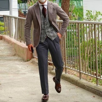 Charcoal Wool Waistcoat Outfits: Try pairing a charcoal wool waistcoat with charcoal dress pants and you'll be the picture of elegance. To infuse a hint of stylish nonchalance into this ensemble, complement this look with brown leather tassel loafers.