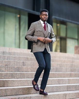 White Waistcoat Outfits: A white waistcoat and navy vertical striped dress pants? This look will make heads turn. And it's amazing how burgundy leather loafers can change up an outfit.