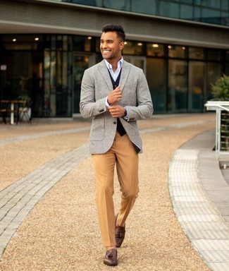 Dark Brown Dress Pants Outfits For Men: Putting together a grey check blazer and dark brown dress pants will cement your styling chops. A pair of dark brown leather tassel loafers is a never-failing footwear option here that's full of personality.