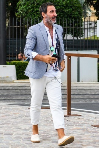White Waistcoat Outfits: A white waistcoat looks so classy when worn with white chinos for an ensemble worthy of a modern gentleman. Why not complete this outfit with white canvas espadrilles for a more laid-back spin?