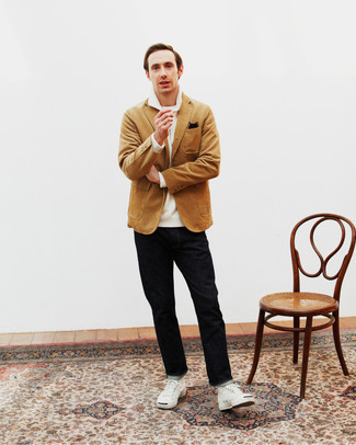 Tan Corduroy Blazer Outfits For Men: A tan corduroy blazer and black jeans teamed together are a smart match. And if you need to easily tone down your outfit with one item, introduce a pair of white canvas low top sneakers to the equation.
