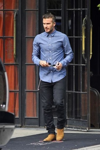 Blue Chambray Long Sleeve Shirt Outfits For Men: If you love off-duty style, why not consider pairing a blue chambray long sleeve shirt with black chinos? Feeling bold today? Spruce up your ensemble with tan suede chelsea boots.