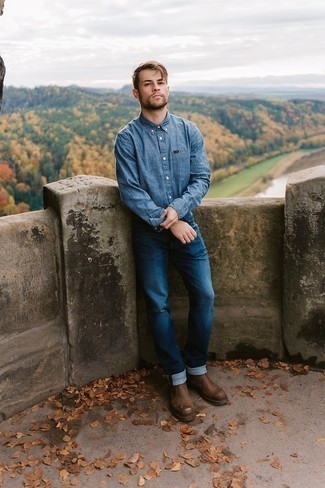 Blue Chambray Long Sleeve Shirt Outfits For Men: Marrying a blue chambray long sleeve shirt with navy jeans is a nice pick for a relaxed casual outfit. You can take a more elegant approach with shoes and add dark brown leather chelsea boots to the equation.