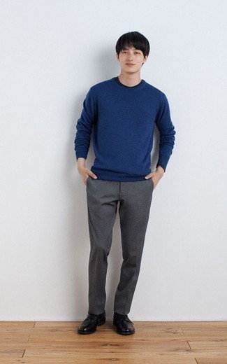 Navy and White Crew-neck Sweater Outfits For Men: Marrying a navy and white crew-neck sweater and grey dress pants is a fail-safe way to inject your styling rotation with some masculine sophistication. Add black leather derby shoes to this getup and you're all set looking awesome.