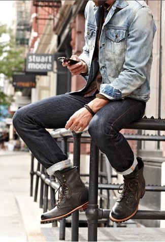If you don't like being too serious with your getups, consider pairing a blue denim jacket with black jeans. Clueless about how to finish off your outfit? Finish off with a pair of dark brown leather casual boots to class it up.