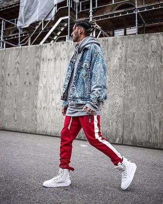 Red Sweatpants Outfits For Men: Pair a blue denim jacket with red sweatpants to feel 100% confident and look stylish. And if you wish to instantly dial down your outfit with one single item, introduce white leather high top sneakers to the equation.