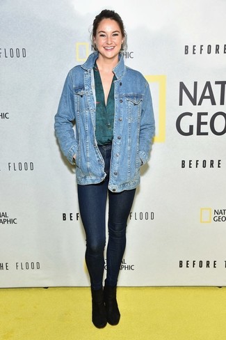 Shailene Woodley wearing Blue Denim Jacket, Teal Long Sleeve Blouse, Navy Skinny Jeans, Black Suede Ankle Boots
