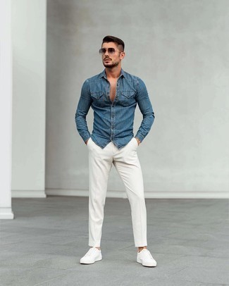 Blue Denim Shirt with White Chinos Outfits: Go for a pared down but casually cool choice by opting for a blue denim shirt and white chinos. We love how a pair of white canvas low top sneakers makes this ensemble whole.