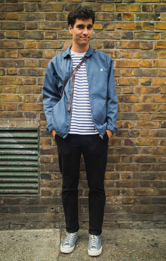 Light Blue Canvas Low Top Sneakers Outfits For Men: This combination of a blue harrington jacket and black chinos is on the casual side yet it's also dapper and extra stylish. Complement your look with light blue canvas low top sneakers to serve a little mix-and-match magic.