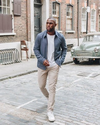 Navy Harrington Jacket Outfits: For an off-duty look with a twist, you can easily rely on a navy harrington jacket and beige chinos. Inject some casualness into your look with the help of a pair of white canvas low top sneakers.