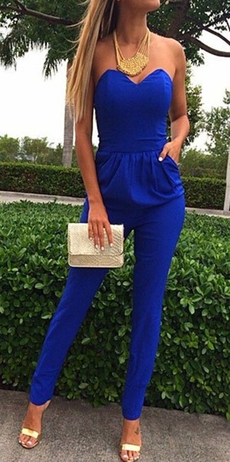 Want to infuse your wardrobe with some elegant cool? Wear a blue jumpsuit. A pair of gold leather heeled sandals instantly boosts the wow factor of this look.