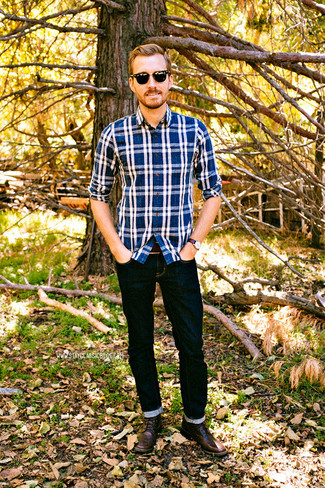 Navy Plaid Long Sleeve Shirt Outfits For Men: A navy plaid long sleeve shirt and navy jeans are a cool combination that will easily take you throughout the day and into the night. Add brown leather derby shoes to the equation to immediately turn up the fashion factor of any look.