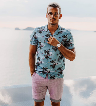 Navy Print Short Sleeve Shirt Outfits For Men: Go for a navy print short sleeve shirt and pink shorts for a casual and fashionable ensemble.