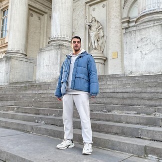 White Track Suit Outfits For Men: On-trend yet comfy, this look is comprised of a white track suit and a blue puffer jacket. Rev up the cool of your getup by finishing with white and black athletic shoes.