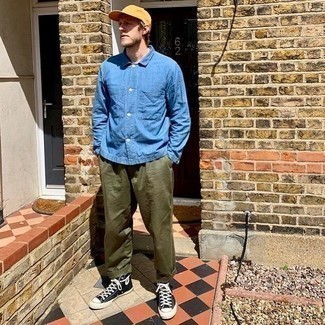 Baseball Cap Outfits For Men: This combination of a blue chambray shirt jacket and a baseball cap is on the casual side yet it's also on-trend and extra stylish. We adore how complete this outfit looks when rounded off with a pair of black and white canvas high top sneakers.