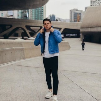Blue Shirt Jacket Outfits For Men: Such items as a blue shirt jacket and black skinny jeans are an easy way to inject some cool into your casual styling repertoire. And if you want to immediately dial down this ensemble with a pair of shoes, complement your look with beige athletic shoes.