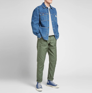 Navy and White Canvas High Top Sneakers Outfits For Men: We're loving how this semi-casual combo of a blue denim shirt jacket and olive chinos immediately makes you look seriously stylish. Hesitant about how to finish? Introduce a pair of navy and white canvas high top sneakers to the mix for a more relaxed touch.