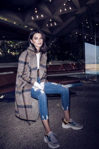 Kendall Jenner wearing Grey Athletic Shoes, Blue Ripped Skinny Jeans, White Long Sleeve T-shirt, Brown Plaid Coat
