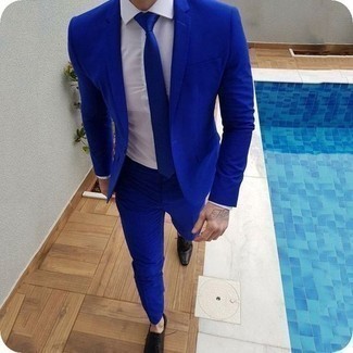 Blue Tie Outfits For Men: One of the best ways to style out such a hard-working menswear item as a blue suit is to team it with a blue tie. Send your outfit a whole other path with black leather derby shoes.