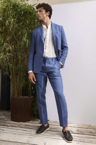 Boat Shoes Outfits: This combination of a blue suit and a white linen long sleeve shirt is ideal for dressier occasions. Complete this outfit with a pair of boat shoes to add a sense of stylish casualness to this ensemble.
