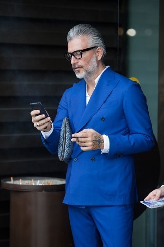 White and Navy Long Sleeve Shirt Outfits For Men After 50: Pair a white and navy long sleeve shirt with a blue suit - this look is guaranteed to make a statement. An appealing idea for a 50-something gent!