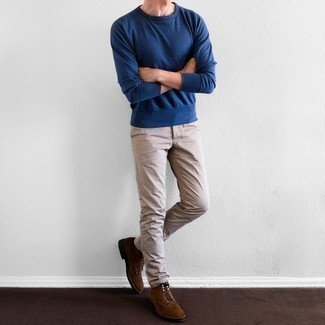 Dark Brown Suede Casual Boots Outfits For Men: This combo of a blue sweatshirt and beige chinos embodies laid-back attitude and comfortable menswear style. Want to go all out on the shoe front? Introduce a pair of dark brown suede casual boots to the equation.