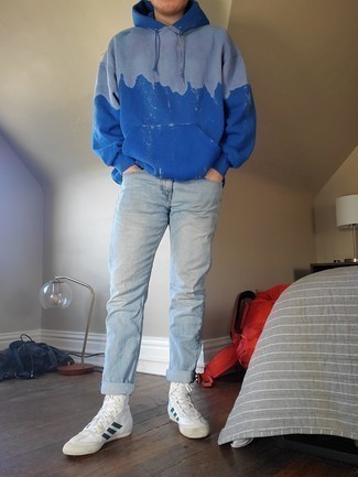 Blue Hoodie Outfits For Men: Go for a simple but casual and cool option combining a blue hoodie and light blue jeans. Feeling bold today? Jazz up this getup by rocking white and navy leather high top sneakers.