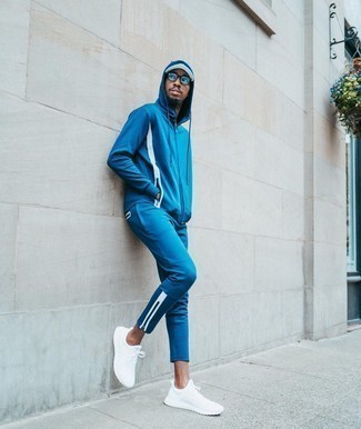 Track Suit Outfits For Men: Opt for a track suit for a laid-back menswear style with an urban twist. And if you need to instantly ramp up this getup with shoes, why not introduce a pair of white athletic shoes to the equation?