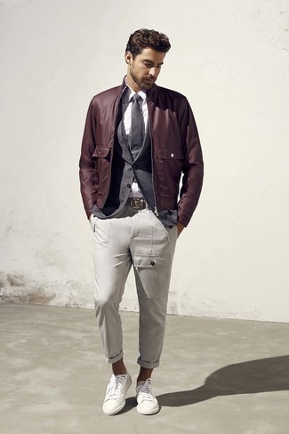 White Dress Shirt with Bomber Jacket Outfits For Men: This pairing of a bomber jacket and a white dress shirt is a must-try casually smart getup for any man. When this getup is just too much, dial it down with white leather low top sneakers.
