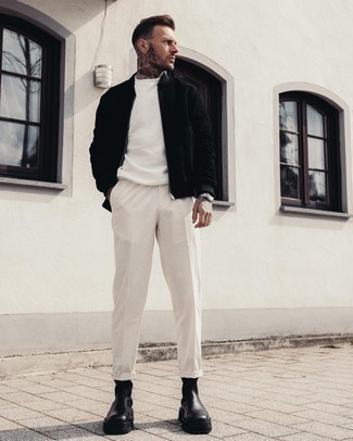 White Crew-neck Sweater Outfits For Men: For a casually dapper look, team a white crew-neck sweater with white chinos — these items go brilliantly together. A cool pair of black leather chelsea boots is an effortless way to infuse a dash of elegance into your ensemble.