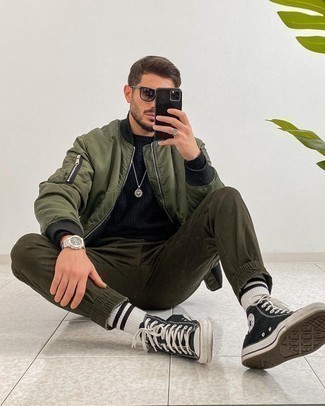 Men's Olive Bomber Jacket, Black Crew-neck Sweater, Olive Chinos, Black and White Canvas High Top Sneakers