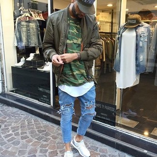 Light Blue Ripped Skinny Jeans Outfits For Men: Putting together an olive bomber jacket with light blue ripped skinny jeans is an on-point choice for a laid-back outfit. For extra fashion points, add white athletic shoes to this ensemble.