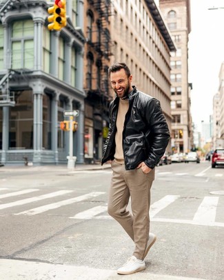 Beige Check Dress Pants Outfits For Men: For an effortlessly neat outfit, try pairing a black leather bomber jacket with beige check dress pants — these two items go brilliantly together. Why not add a pair of beige leather low top sneakers to the mix for a carefree vibe?