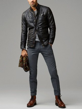 To look sleek and sharp, pair a black quilted leather bomber jacket with charcoal wool dress pants. You know how to dial it up: dark brown leather dress boots.