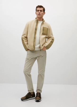 White Crew-neck Sweater Outfits For Men: Marrying a white crew-neck sweater with beige jeans is an awesome idea for a casual outfit. For a more casual feel, go for brown athletic shoes.