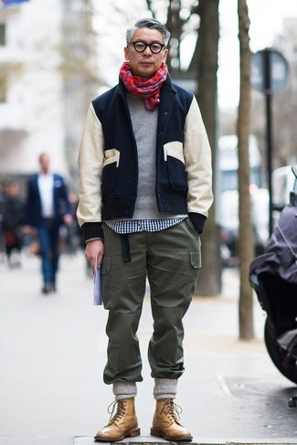 Burgundy Scarf Outfits For Men: A navy and white bomber jacket and a burgundy scarf are a cool look to have in your day-to-day casual fashion mix. Want to dial it up with shoes? Introduce a pair of tan leather brogue boots to this ensemble.