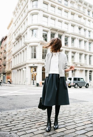Grey Midi Skirt Outfits: This off-duty combo of a grey bomber jacket and a grey midi skirt is a fail-safe option when you need to look stylish in a flash. Introduce black leather lace-up flat boots to the mix to immediately kick up the cool of your look.