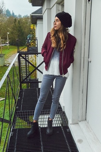 Burgundy Bomber Jacket Outfits For Women: A burgundy bomber jacket and grey skinny jeans are great pieces to have in the casual part of your wardrobe. To add some extra fanciness to your getup, enter black chunky leather ankle boots into the equation.